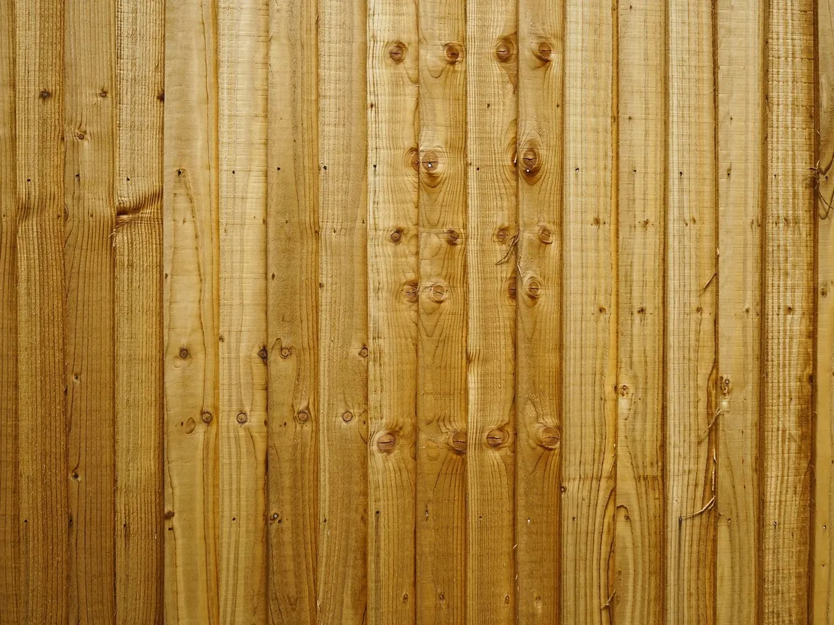 A new cedar board fence seen straight on